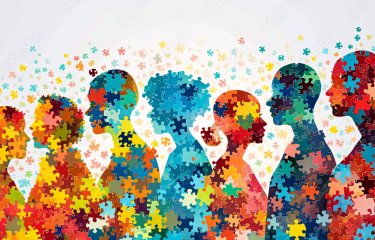 Les silhouettes d'un groupe de personnes sont représentées sous forme de puzzle. Le concept d'unité et de diversité des individus est ainsi illustré.